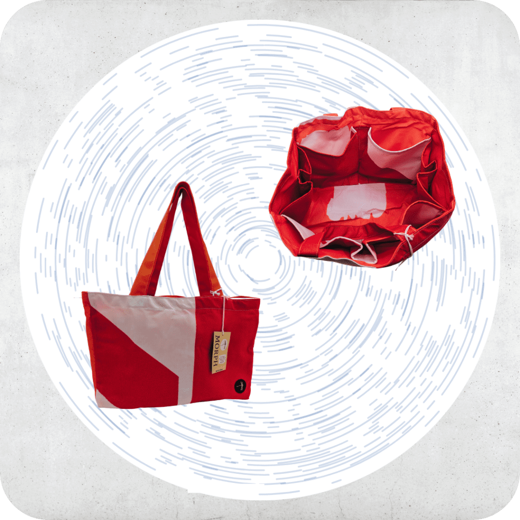 An orange and white upcycled Market Bag is pictured with a front view on the left and another looking down into the bag showing eight pockets lining it for organization.