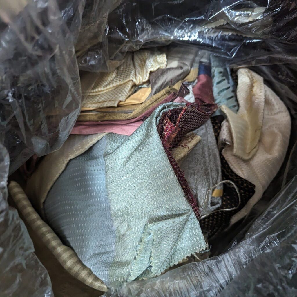 Bag filled with Thai silk scraps A bag filled with Thai silk scraps.
