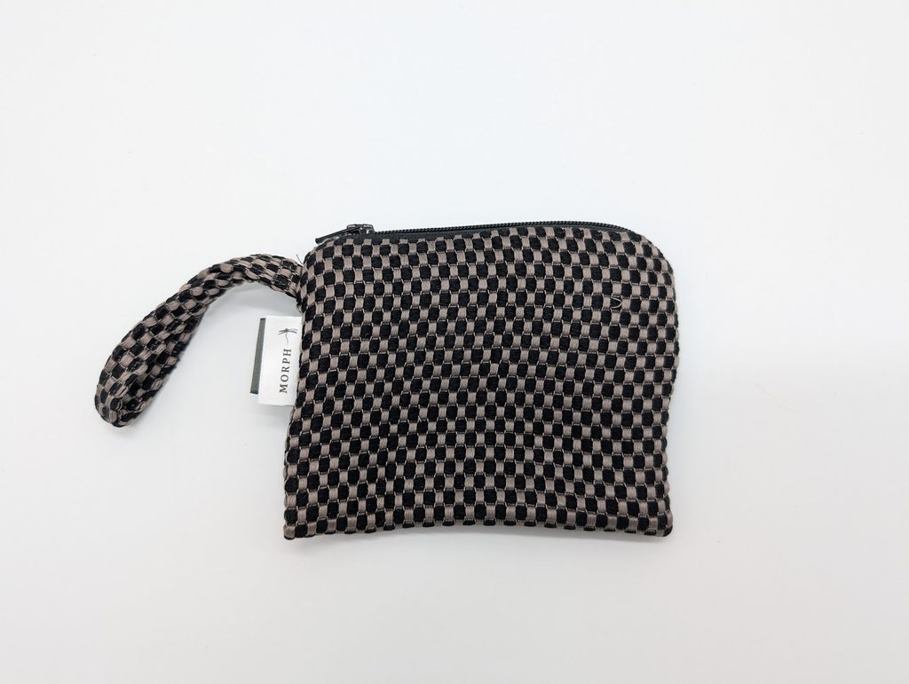 A double-layer Tahi silk coin purse with a YKK zipper, made by an informal seamstress via Morph Bags' partnership with Second Change Bangkok.