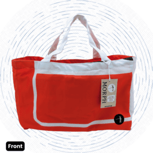The front view of a one-of-a-kind reddish-orange Morph Market Bag with white trim and a thin white rectangular outline on the front.