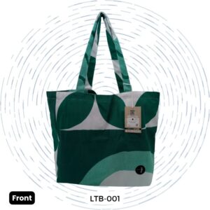The front view of a one-of-a-kind green and white Large Morph Tote with Benefits featuring a bold abstract leaf-like pattern.