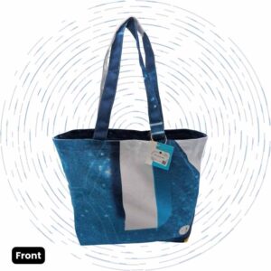 The front view of a one-of-a-kind tote featuring a distinct abstract art pattern in shades of blue and white.